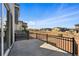 Outdoor patio with black metal railing and view of the neighborhood at 7279 Prairie Sage Pl, Littleton, CO 80125