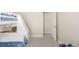 Bedroom features a bunkbed, carpet, and access to a hallway at 3041 S Glencoe St, Denver, CO 80222