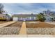 Charming single-story home featuring a well-maintained front yard and a cozy, inviting entrance at 3041 S Glencoe St, Denver, CO 80222