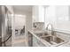 Well-maintained kitchen with stainless steel appliances and granite countertops at 3041 S Glencoe St, Denver, CO 80222