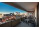 Private balcony with wicker furniture and city views at 800 N Pearl St # 406, Denver, CO 80203