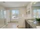 Elegant bathroom with double vanity and a large walk-in shower at 11822 Meadowood Ln, Parker, CO 80138