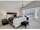 Luxurious main bedroom with bay windows and plush carpeting at 11822 Meadowood Ln, Parker, CO 80138