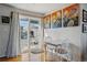 Bright dining area with sliding glass doors to outdoor space and modern decor at 1730 W 51St Ave, Denver, CO 80221