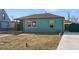 Cozy single-story home featuring tidy landscaping and a private side yard at 1730 W 51St Ave, Denver, CO 80221