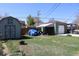Large backyard with storage shed and a one car detached garage at 1730 W 51St Ave, Denver, CO 80221