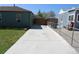 Long driveway between two houses, with parking and easy access at 1730 W 51St Ave, Denver, CO 80221