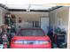 A garage interior featuring car parking, workspace, and a storage unit for your tools at 1730 W 51St Ave, Denver, CO 80221