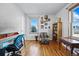 Charming home office with hardwood floors, a desk and chair, and tasteful décor at 1730 W 51St Ave, Denver, CO 80221