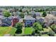 Aerial view of a home's backyard, featuring a well-manicured lawn and a wooden fence at 3689 Primrose Ln, Castle Rock, CO 80109