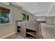 Finished basement with wood bar and wood-look floors throughout the space at 3689 Primrose Ln, Castle Rock, CO 80109