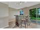 Finished basement featuring a wood bar, with a granite top, and sliding glass doors at 3689 Primrose Ln, Castle Rock, CO 80109
