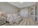 This bedroom features carpet flooring and a closet with white doors at 3689 Primrose Ln, Castle Rock, CO 80109