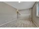 Empty bonus room featuring neutral carpet, gray paint and a light fixture at 3689 Primrose Ln, Castle Rock, CO 80109