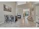 The dining room features tile floors and views of the staircase and adjacent living spaces at 3689 Primrose Ln, Castle Rock, CO 80109