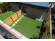 Backyard with artificial turf, stepping stones, and privacy fence at 21 Washington Ave, Golden, CO 80403