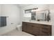 Well-lit bathroom with modern fixtures, sleek vanity, and a neutral color palette at 21 Washington Ave, Golden, CO 80403