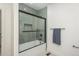 Contemporary bathroom with tiled shower over tub and modern black fixtures at 21 Washington Ave, Golden, CO 80403