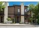 Beautiful home featuring a wood facade, stone accents, front porch, and manicured landscaping at 21 Washington Ave, Golden, CO 80403