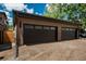 Spacious two-car garage featuring modern doors and ample parking space at 21 Washington Ave, Golden, CO 80403