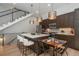 Gourmet kitchen featuring modern pendant lights, white countertop island, and dining area at 21 Washington Ave, Golden, CO 80403