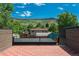 View from the rooftop deck showcases neighborhood, trees and a hillside at 21 Washington Ave, Golden, CO 80403
