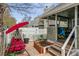 Charming backyard patio with red swing, raised garden, and play area, perfect for outdoor relaxation and entertainment at 10474 W Purgatoire Peak, Littleton, CO 80127
