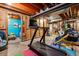 Unfinished basement with workout equipment, perfect for a home gym or fitness area at 10474 W Purgatoire Peak, Littleton, CO 80127