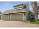 Charming home featuring a 2-car garage, well-maintained landscaping, and traditional architectural design at 10474 W Purgatoire Peak, Littleton, CO 80127