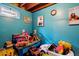 Bright and colorful playroom with ample space for toys, games, and creative activities at 10474 W Purgatoire Peak, Littleton, CO 80127