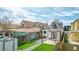 A charming backyard features a lush lawn, a patio, and a shed, perfect for outdoor entertaining at 3050 N Marion St, Denver, CO 80205