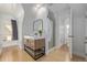 Modern bathroom features a stylish vanity with a vessel sink, neutral decor, and a walk-in shower at 3050 N Marion St, Denver, CO 80205