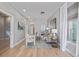 Well-lit living room with hardwood floors, a cozy sofa, and stylish decor throughout at 3050 N Marion St, Denver, CO 80205