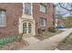 Charming brick building entrance featuring a decorative archway and elegant glass doors at 2115 E 14Th Ave # 8, Denver, CO 80206