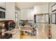 Efficient kitchen design featuring stainless steel appliances and ample storage space at 2115 E 14Th Ave # 8, Denver, CO 80206