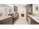 Stylish kitchen with granite countertops, stainless steel appliances, and a peek into the bathroom at 10525 W 18Th Ave, Lakewood, CO 80215