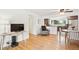 Light-filled living area with hardwood floors, open to the kitchen, perfect for entertaining at 10525 W 18Th Ave, Lakewood, CO 80215