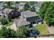 Aerial view of backyard with patio area, trampoline, grassy area and privacy fence. Perfect for outdoor enjoyment at 8229 Cottongrass Ct, Castle Pines, CO 80108