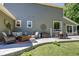 Backyard patio with comfortable outdoor seating and dining furniture. Space for lounging and relaxing at 8229 Cottongrass Ct, Castle Pines, CO 80108