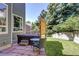 Outdoor space with a hot tub and chairs to lounge. Perfect for entertaining or relaxing at 8229 Cottongrass Ct, Castle Pines, CO 80108