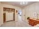 Bedroom featuring an open closet, dresser and a chandelier at 8229 Cottongrass Ct, Castle Pines, CO 80108