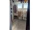 Well-organized walk-in closet with shelving and hanging rods for optimal storage solutions at 8229 Cottongrass Ct, Castle Pines, CO 80108