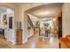 Open concept home showcasing the dining room leading to the kitchen and living spaces at 8229 Cottongrass Ct, Castle Pines, CO 80108