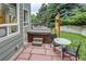 Backyard with a hot tub, outdoor seating, and a patio area for relaxation and entertainment at 8229 Cottongrass Ct, Castle Pines, CO 80108