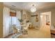 Cozy sitting room with a view of a garden, an area to play music, and is brightly lit at 8229 Cottongrass Ct, Castle Pines, CO 80108
