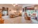 Comfortable main bedroom featuring neutral tones, a seating area, and plush furniture at 8229 Cottongrass Ct, Castle Pines, CO 80108
