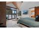 Bright bedroom featuring a large window with outdoor views and a modern design at 444 Glen Eagle Loop, Breckenridge, CO 80424