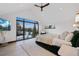 Bright bedroom with large windows, vaulted ceilings, and views of the surrounding landscape, creating a serene retreat at 444 Glen Eagle Loop, Breckenridge, CO 80424