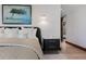 Bedroom detail showcasing a stylish nightstand and artwork, enhancing the room's sophisticated ambiance at 444 Glen Eagle Loop, Breckenridge, CO 80424