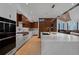 Bright kitchen with large island, stainless steel appliances, and custom wood cabinets at 444 Glen Eagle Loop, Breckenridge, CO 80424